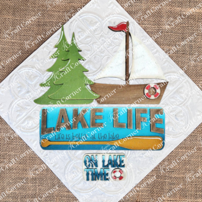 The Lake Life Interchangeable Insert by Janet's Craft Corner is a DIY seasonal home decor craft kit with 3 pieces, perfect for adding lake-themed charm to your space.