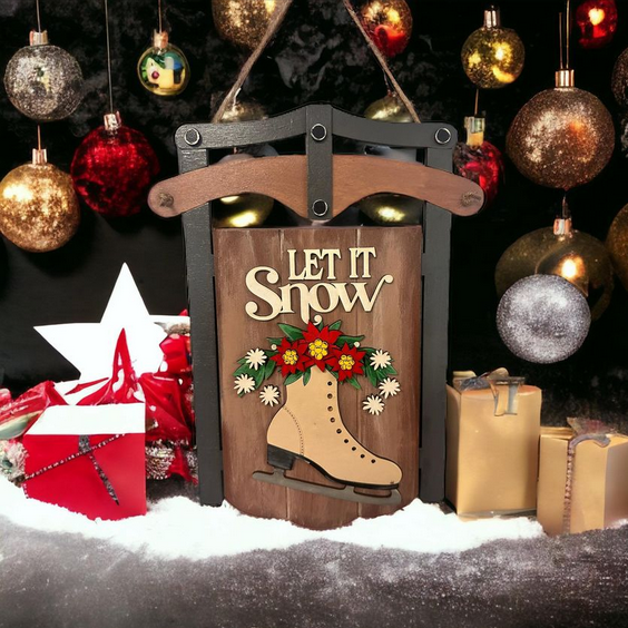 Transform your home into a holiday wonderland with Janet's Craft Corner's "Let It Snow Sled Sign." This DIY kit includes premium crafting supplies to create a festive scene, featuring a charming wooden decoration with the message "Let It Snow," complemented by an ice skate adorned with flowers. Surround it with twinkling ornaments and gift boxes against a dark background for the perfect festive touch.