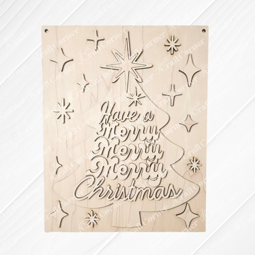 Janet's Craft Corner "Have a Merry Christmas Tree Wall Hanger" DIY craft kit includes a laser-cut wooden plaque with festive stars, perfect as seasonal decor or a unique holiday wall hanger. Set of 1.