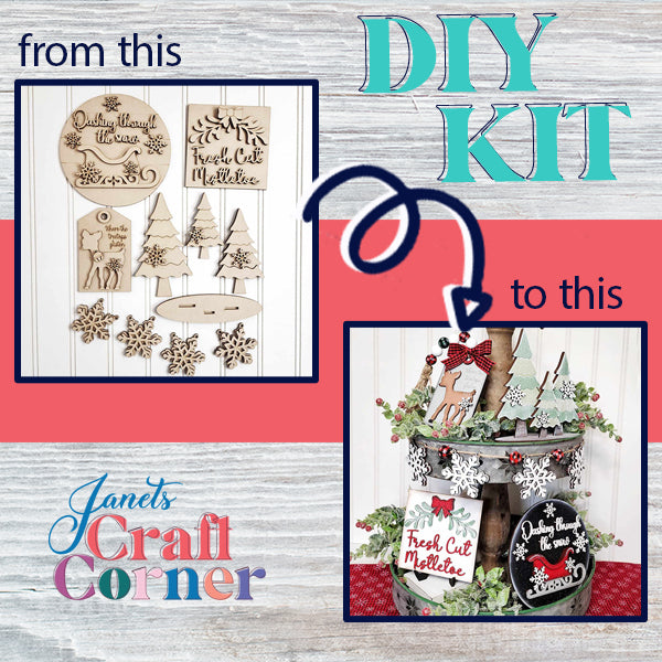 Discover Janet's Craft Corner's Mistletoe Tiered Tray DIY Decor Kit, a set of 5 hand-painted wooden cutouts including trees, snowflakes, and banners. Perfect for crafting your own festive decor or adding charm to your tiered tray display, this kit comes with a finished example to spark holiday-inspired creativity.