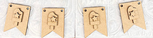 Five wooden pieces in the shape of banners, featuring ice cream and star cutouts, are arranged in a row on a gently patterned surface. Each piece is equipped with two holes at the top, making them perfect for use in a DIY Kit. This set is an ideal addition to your farmhouse-style decor or Janet's Craft Corner's Patriotic - Tiered Tray Kit.