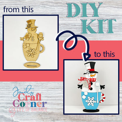 Explore Janet's Craft Corner's DIY Kit, which turns a wooden snowman cutout into a delightful home décor item. With a top hat, scarf, and snowflake decorations, it goes from plain to vibrant. Complement it with our charming Snowman Hot Cocoa Mug Shelf Sitter!