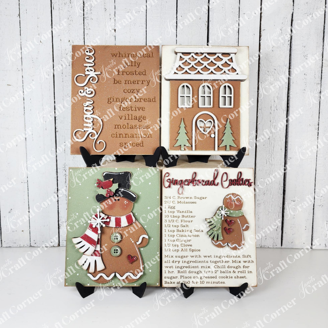 Set of gingerbread-themed decorative signs on a wooden background
