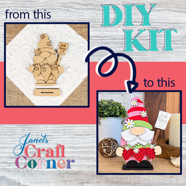 An advertisement for a DIY Kit from Janet's Craft Corner features a wooden gnome cutout on the left and the delightful Strawberry Gnome, adorned with a red hat and strawberry apron, on the right. Text reads "from this to this" with an arrow illustrating the transformation. Farmhouse décor craft items fill the background.